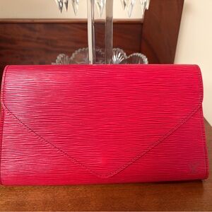 SOLDAuthentic Louis Vuitton Red Women's Clutch